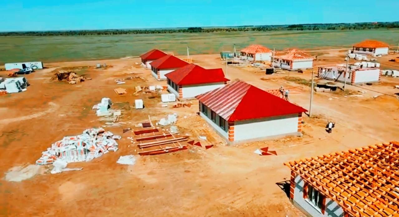 In the village of kobda, builders moved to cover the roofs of 61 houses