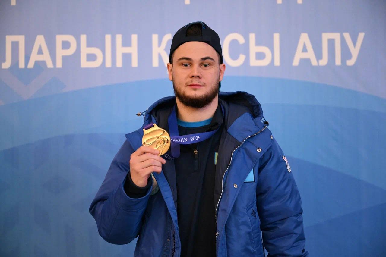 Чемпионымыз үйге оралды