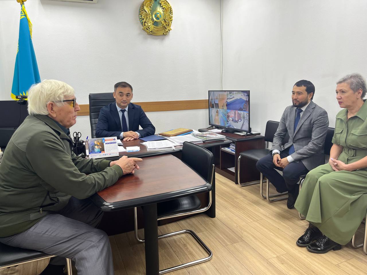 Оқ атудан аға жаттықтырушысымен кездесу