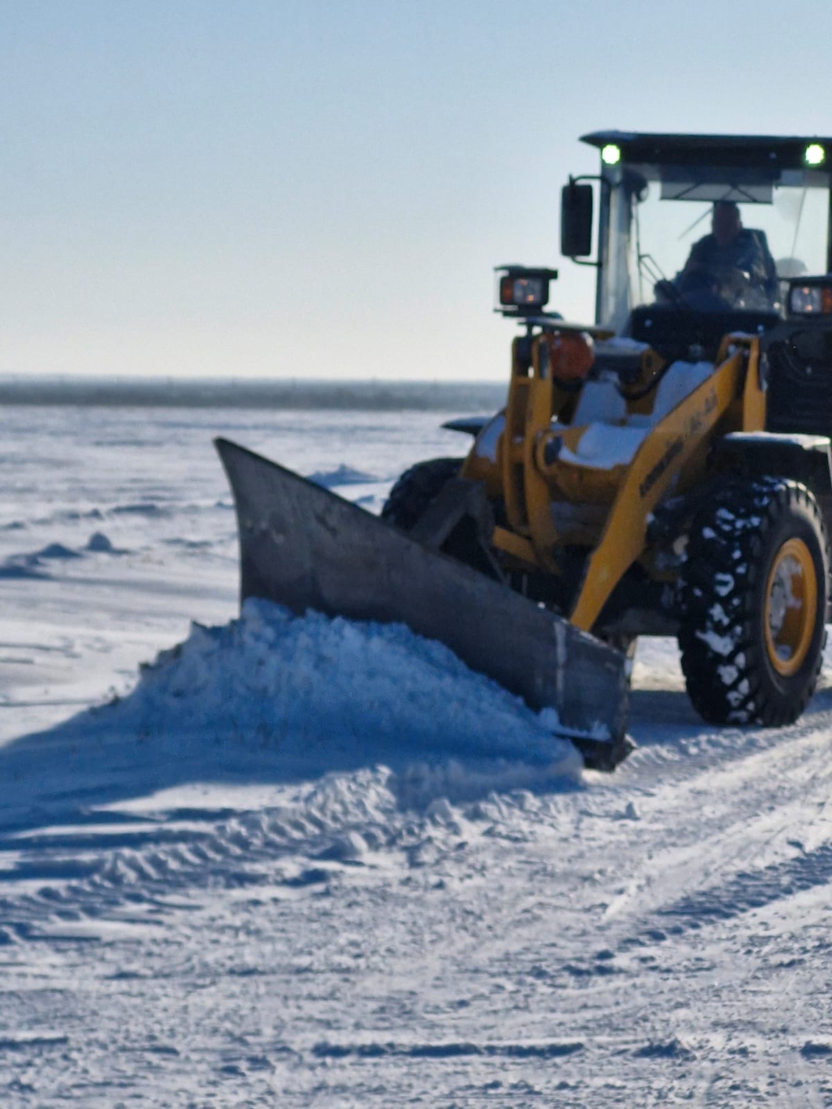 Көшелерді қардан тазалау