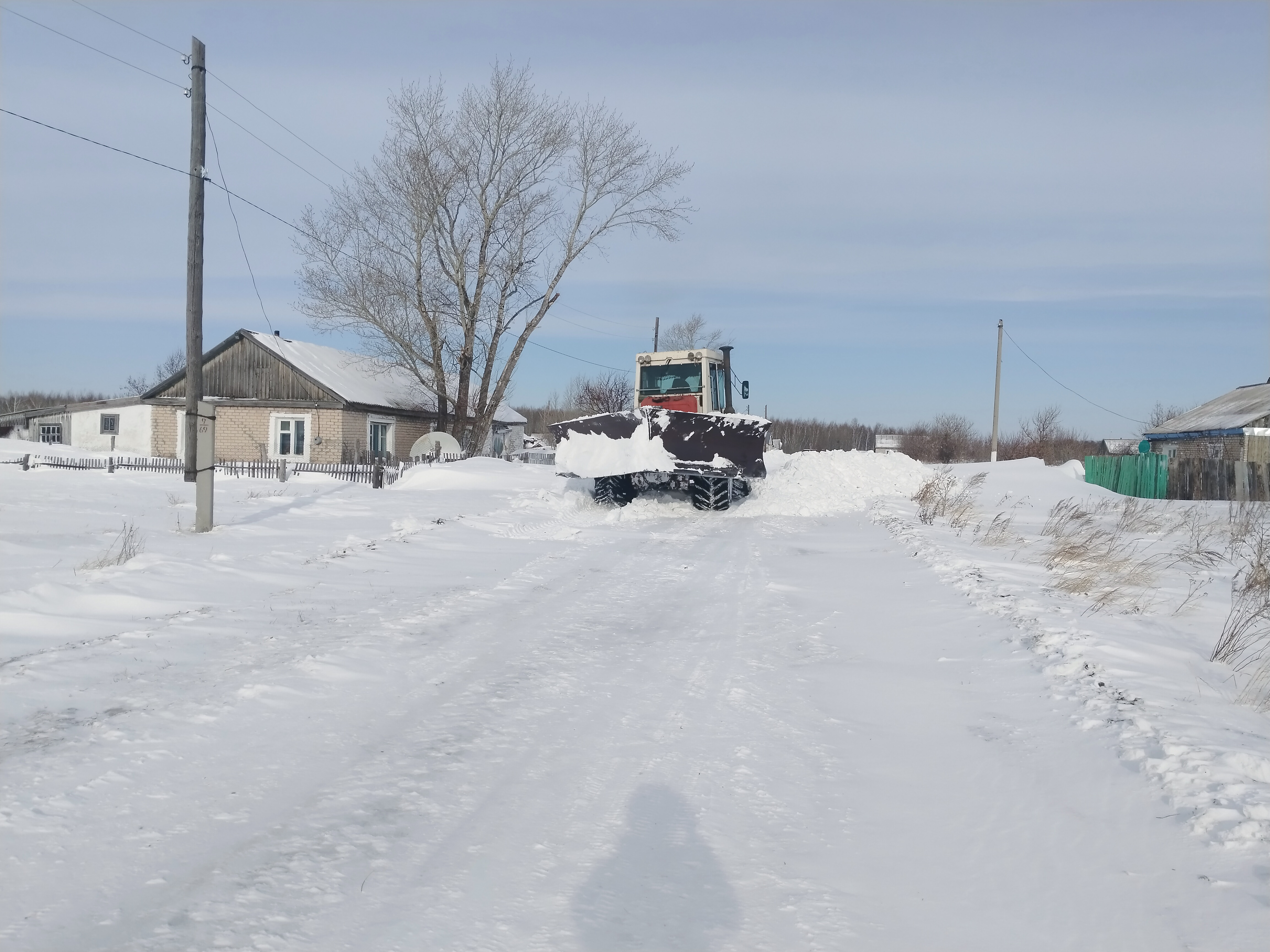 Қыста көшелерді тазалау