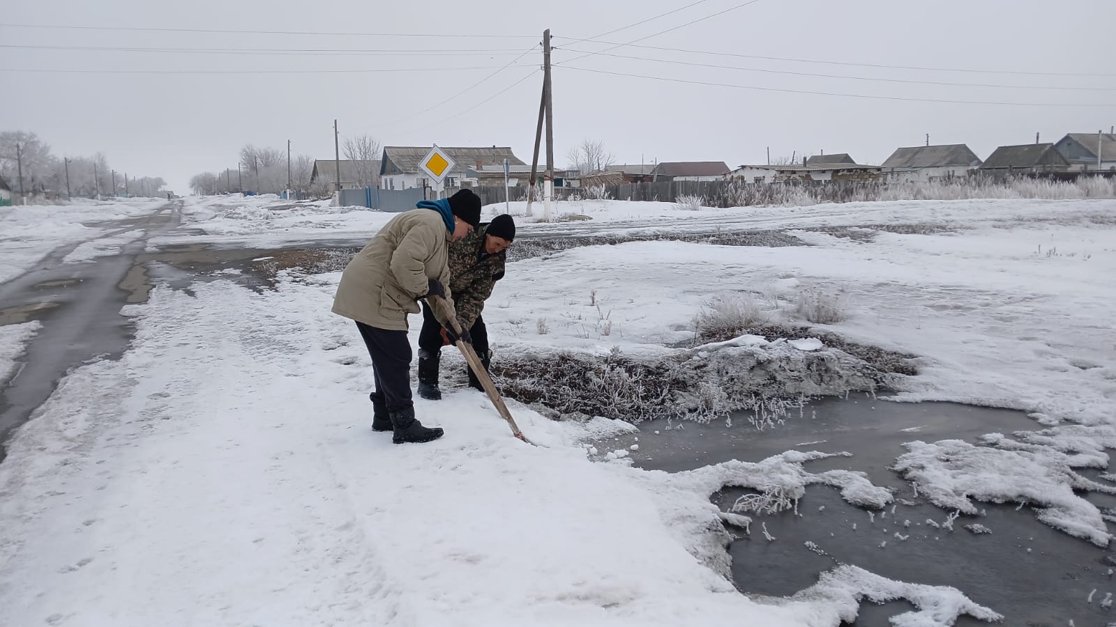 Көшелерді қардан тазарту