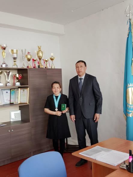 Аралбай ауылының көп балалы анасы Тайман Айтжан Толыбайқызына “Күміс алқа” медалі табысталды